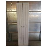 2 door cabinet & a few towels and sheets 72x18x15