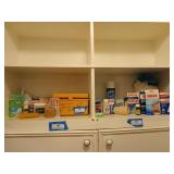 Contents of Hall shelves, mostly Band-Aids