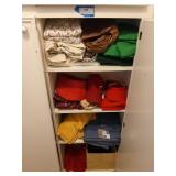 Contents of hall closet, includes linens, red