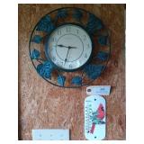 Wall clock, thermometer, shelf with contents,