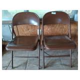 2 metal folding chairs