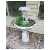 Three-piece concrete bird bath 45 inches tall,