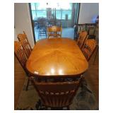 Oak dining table w/ 8 chairs 30 x 65.5 x 42 w/