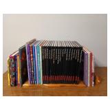 Cute little book display with 34 books, mostly