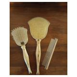 Vintage vanity set, mirror, brush, comb. Comb is