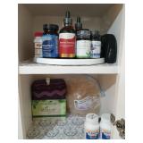 3 shelves of assorted supplements, aspirin,