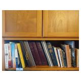 Shelf of bibles, healthy living books, other books