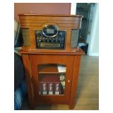 Crosley CR247 composer CD recorder on cabinet,