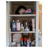 Contents of 3 shelves: soaps, razors, shaving