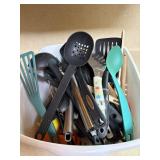Bin of kitchen utensils inc wooden, plastic and