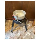 Propane cooker with a basket