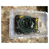 Bin of extension cords and surge protectors