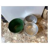 Three metal pails. Green one has a handle