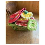 Small basket of crocheted potholders and