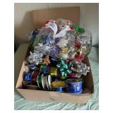 Box of bows and ribbon, some brand new and a lot