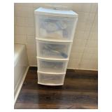 Plastic roller cart with contents included; cart