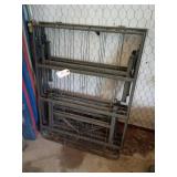 Two metal folding twin bed frames