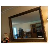 Beautiful ornately framed mirror 30x38