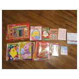 Plastic tub of lots of coloring books, puzzle