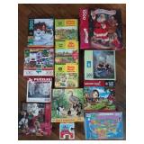 Plastic tub of assorted puzzles