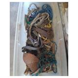 Plastic tub of horse tack