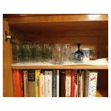 Contents of 3 shelves: cookbooks, Christmas