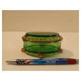 Green glass candy dish compliments of Levinson