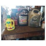 Grass killer, plant food, seven dust - half full