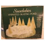 Dept 56 snowbabies animated skating pond