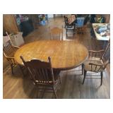 Oak dining table w/ 6 chairs, 2 need repair
