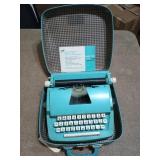 Petite feather touch typewriter in case