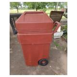 Rolling trash can with handle