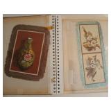 Old photo album of silk border cards