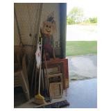 Scarecrow, assorted picture frames, wall