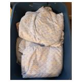 Plastic tub of king? sheet set, lots of pillow