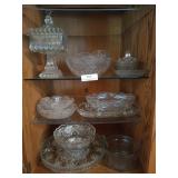 3 shelves of assorted glassware