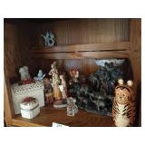 Shelf of lovely collectibles and trinkets, tiger