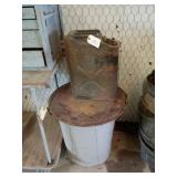 Metal Jerry can and plastic trash can