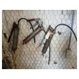 Three grease guns