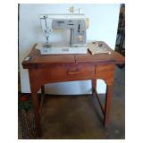 Singer sewing machine on wooden table 30x20x29