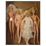 4 asst Barbies