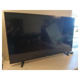Sharp 57" flat screen Roku TV with remote