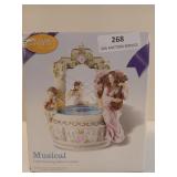 Musical Angel crossing water fountain