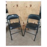 2 metal padded folding chairs