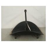 Metal firewood holder with porcelain handle