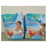 2 new packs of Pampers splashers size 5