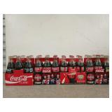 4 Coca-Cola six packs