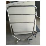 Towel warming rack, works