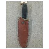 Knife in leather sheath 7" blade