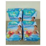 4 new packs Pampers splashers size 5